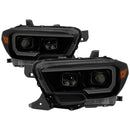 xTune Toyota Tacoma 16-18 DRL Faros delanteros con barra de luz - Negro ahumado PRO-JH-TTA16-LBDRL-BSM