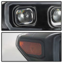 xTune Toyota Tacoma 16-18 DRL Faros delanteros con barra de luz - Negro PRO-JH-TTA16-LBDRL-BK